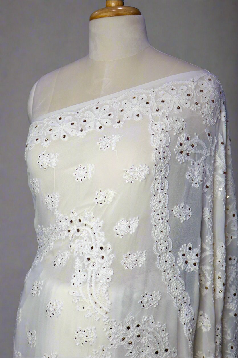 Alnoora Hand Embroidered Mukaish Work White Viscous Georgette Lucknowi Chikankari Saree .